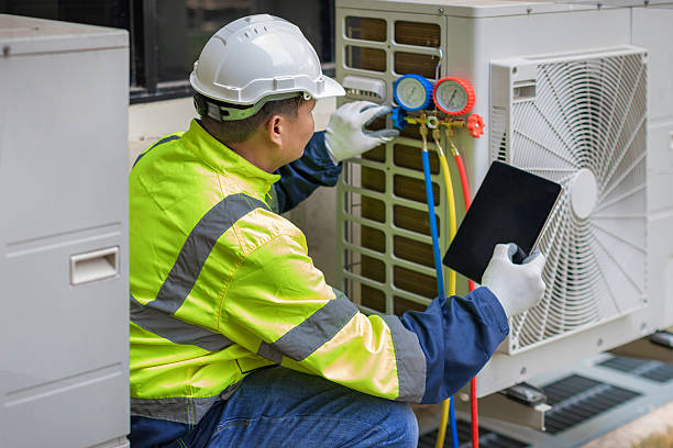 Professional Air Duct Cleaning technician working in Cedar Grove, NJ